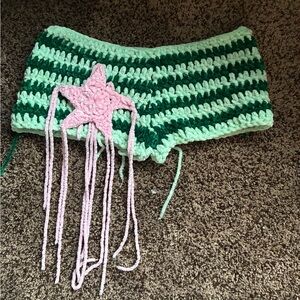 Dolls Kill Green Striped Crochet Women's Shorts with Pink Star Accent